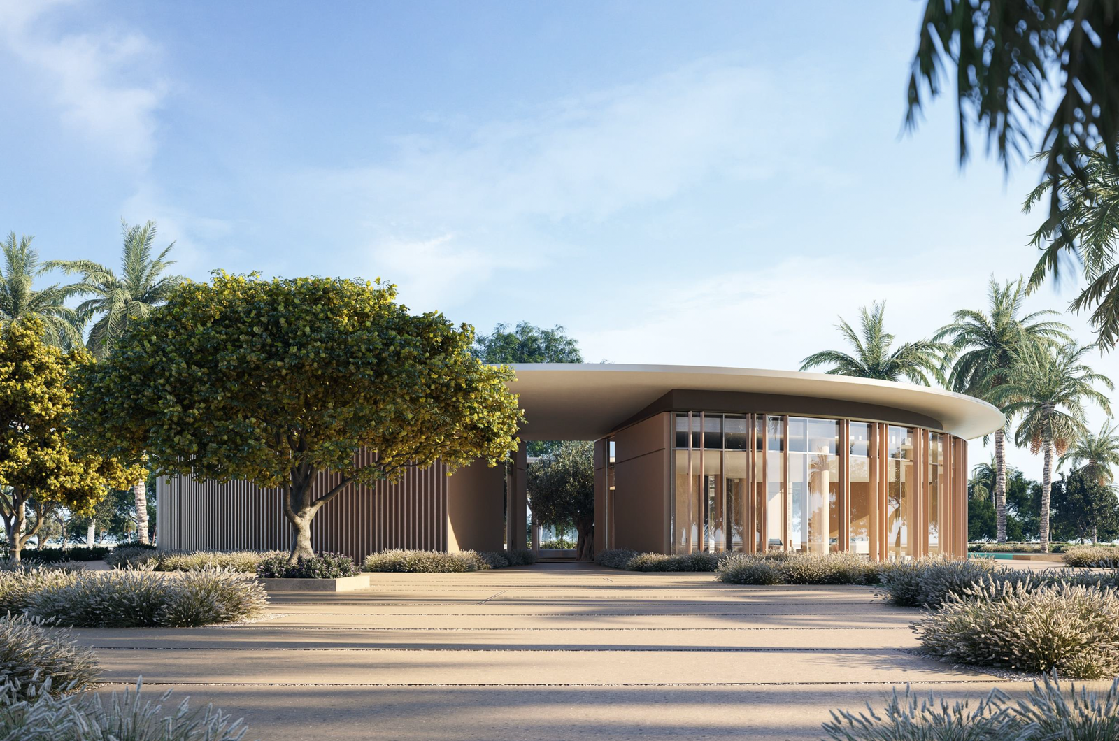 Jogging trail and padel courts surrounded by natural landscaping at Fay Valley, Masdar City.